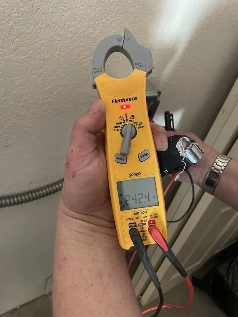 Voltage testing with clamp meter during Hot Tub / Pool Electrical Wiring in Olney